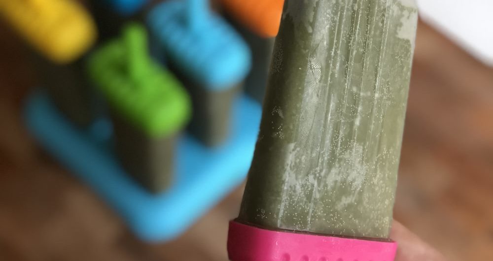 green-smoothie-creamsicles-holding popsicle-over-others
