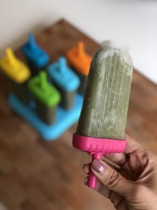 green-smoothie-creamsicles-holding popsicle-over-others